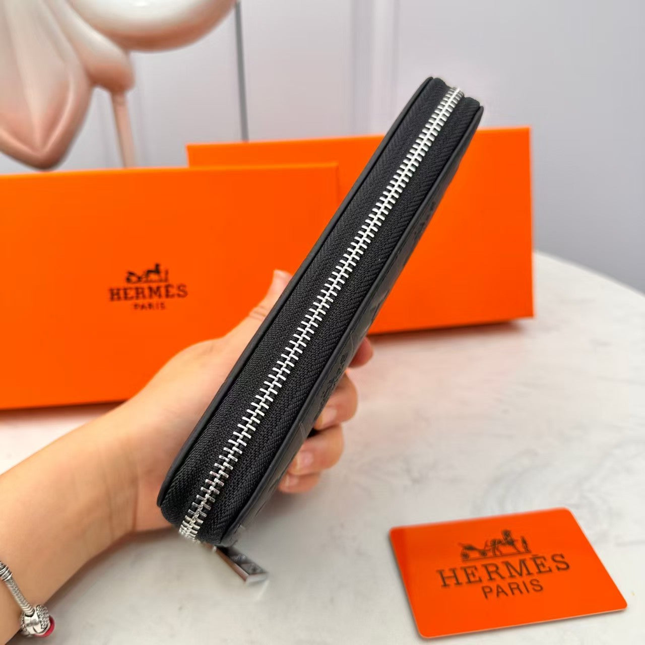 Portefeuille en cuir gaufré noir H