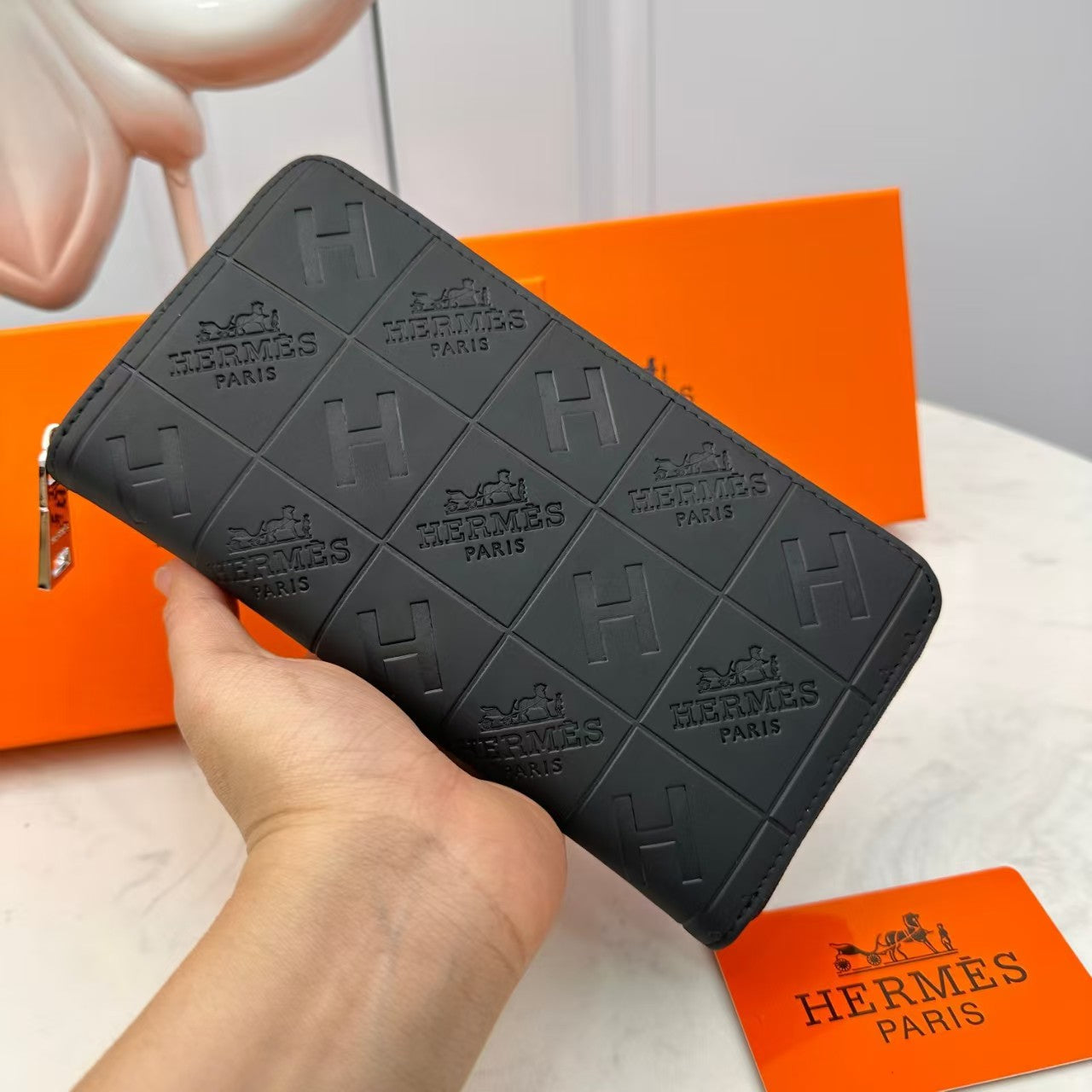 Portefeuille en cuir gaufré noir H