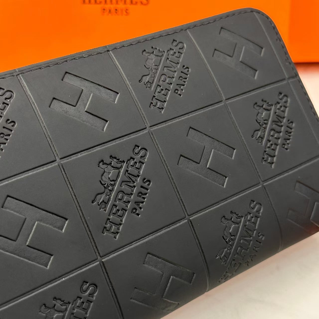 Portefeuille en cuir gaufré noir H