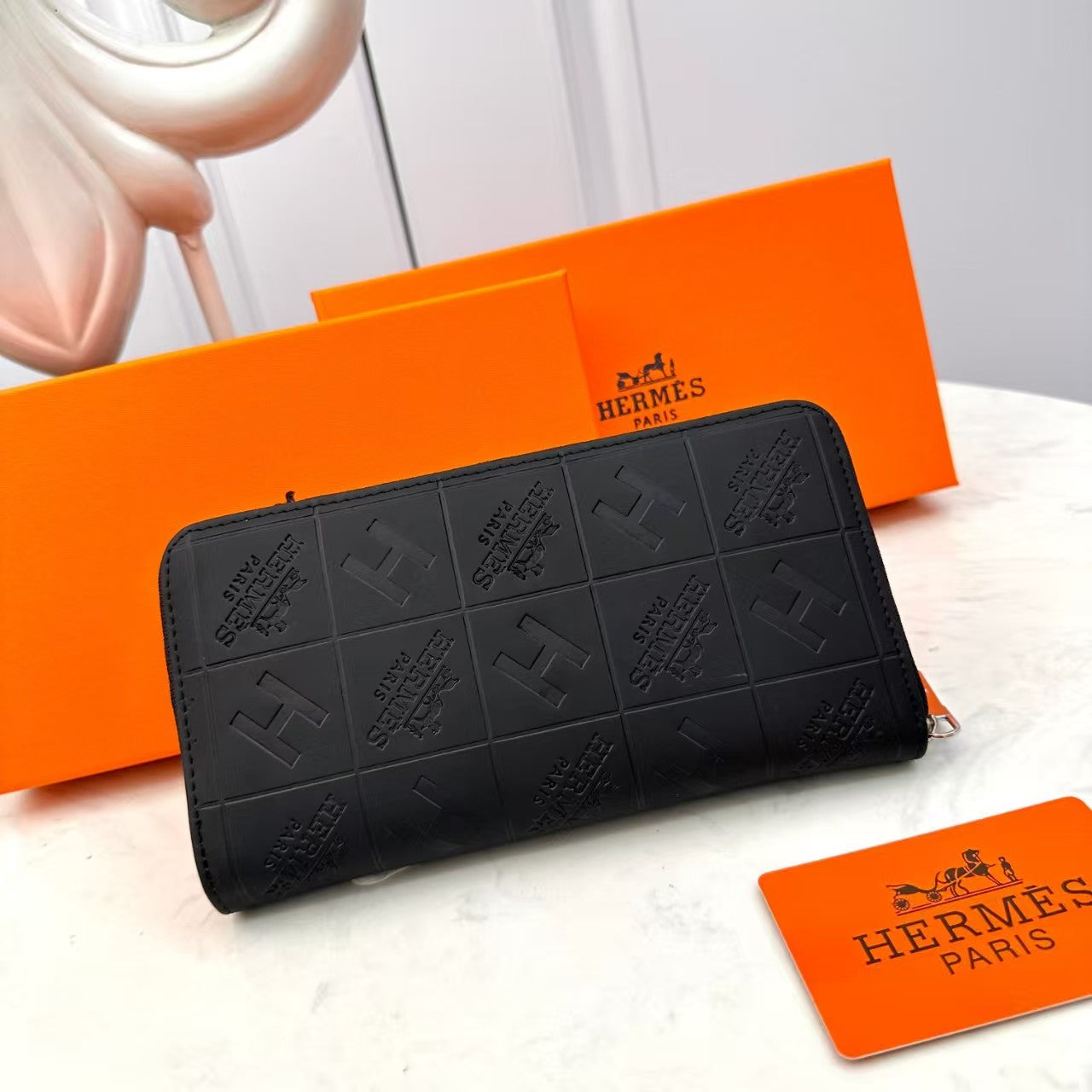 Portefeuille en cuir gaufré noir H