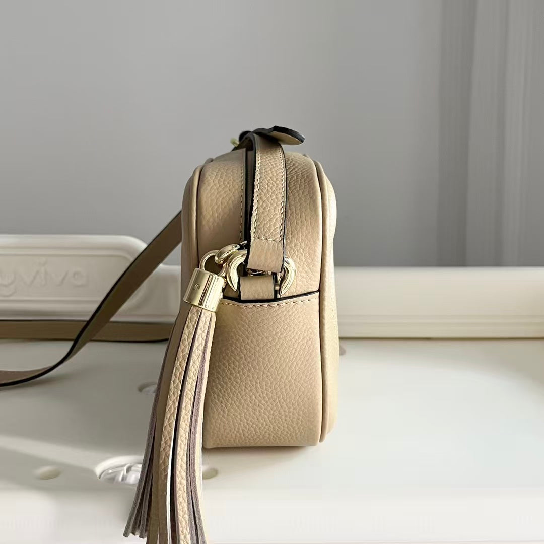 Sac bandoulière avancé en cuir grainé