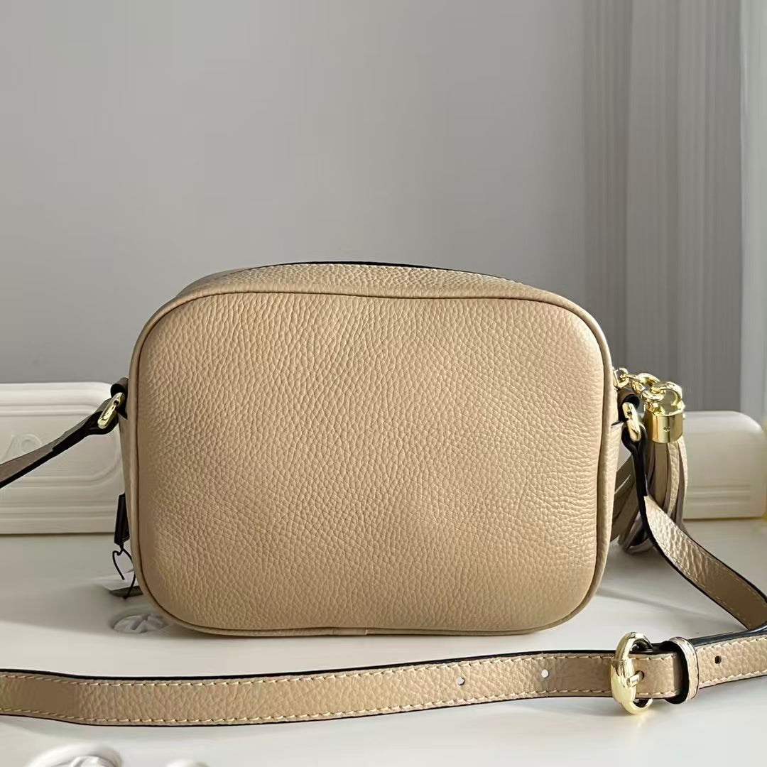 Sac bandoulière avancé en cuir grainé