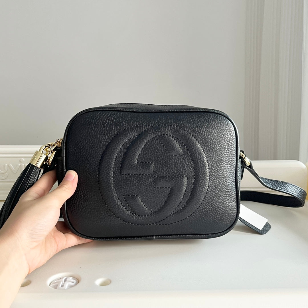 Sac bandoulière avancé en cuir grainé