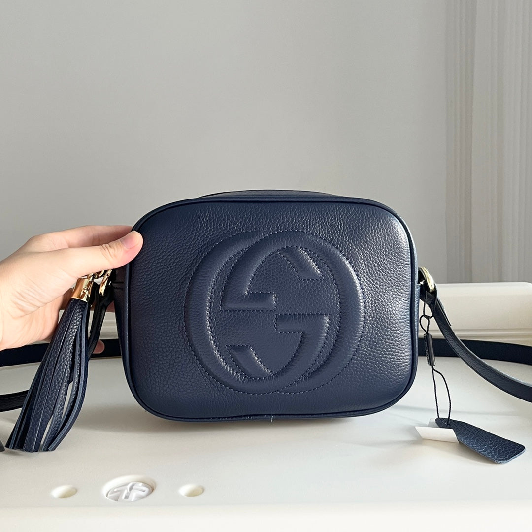 Sac bandoulière avancé en cuir grainé