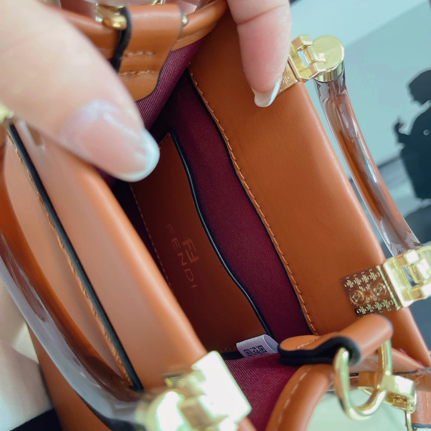 Klassisk mulepose med crossbody-strop