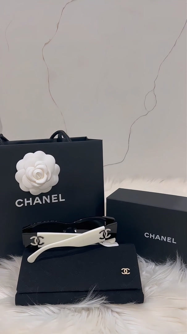 Occhiali da sole rettangolari in acetato alla moda